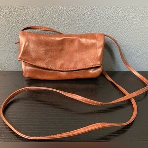 Slim brown cross body purse
